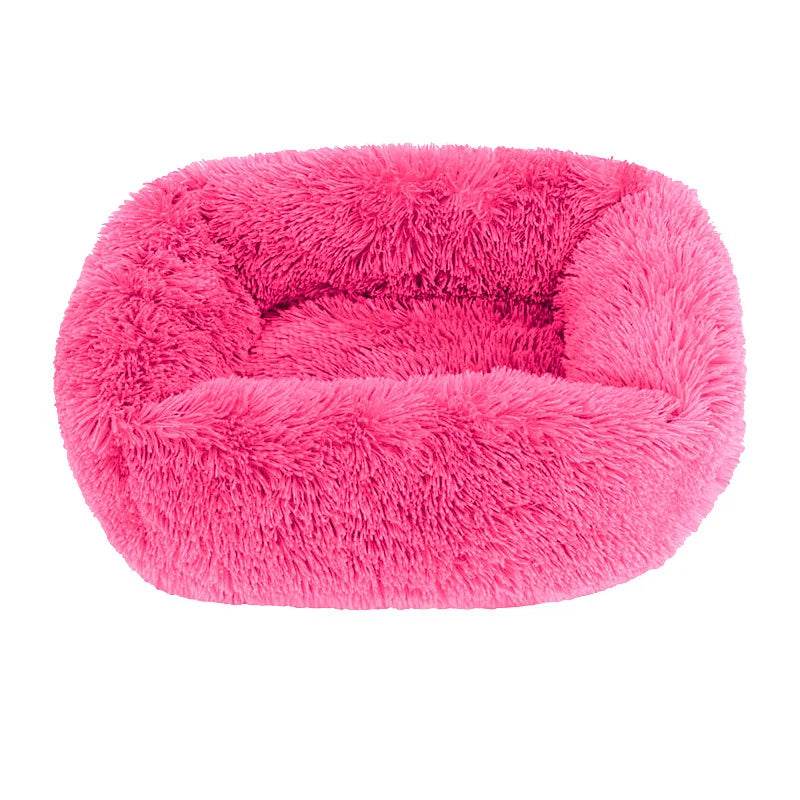 Square dog bed in rose red long plush, with high fluffy walls around a padded base