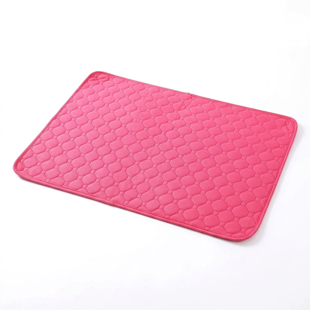 Rose red quilted pet mat, a deep pink with octagon stitching, lying at an angle