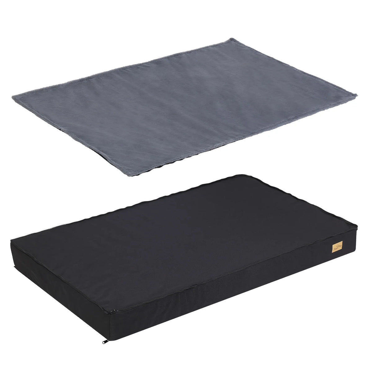 Grey plush cover lifted off the black waterproof foam mattress of the dog bed