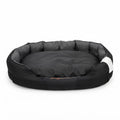 XXL bed for dogs in black Oxford fabric, oval with a padded grey-lined rim and a removable cushion